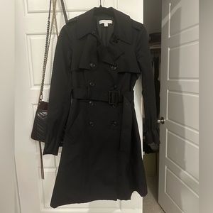 trench coat its still looks like new, theres one small tear inside,lost the band